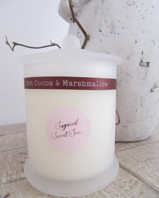 A frosted Hot Cocoa & Marshmallow jar candle